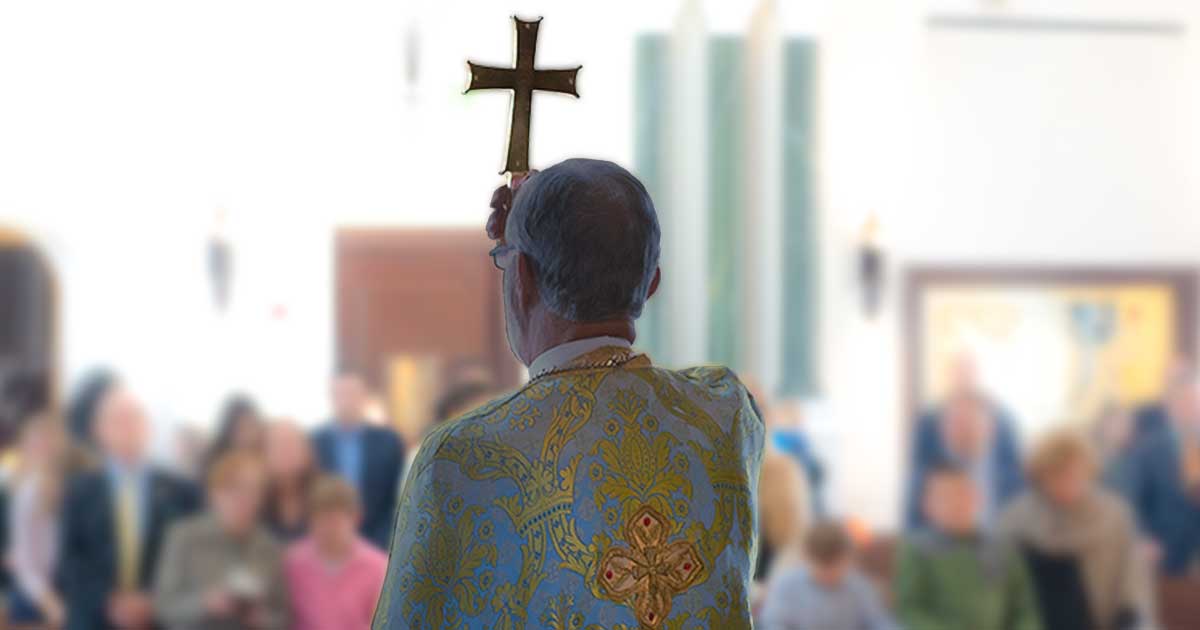 Priest blessing the congregation